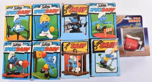 Boxed and loose Smurf figures,