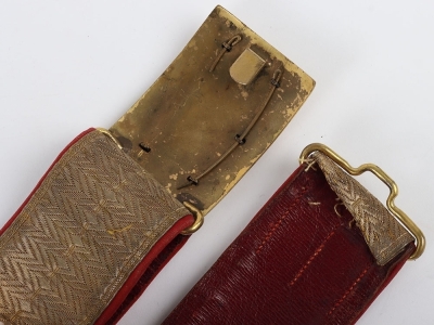 6th Inniskilling Dragoon Officers Full Dress Waist Belt & Slings. Red leather waist belt with scarlet cloth edges and under tunic sword slings all with gilt regimental lace, however a non regimental VR silver & gilt dragoon buckle. In good condition. - 4