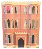 English painted pink wooden dolls house in the Gothic style,