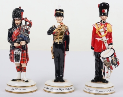 3 Michael Sutty Porcelain Figures: Scots Guards Piper, RA Bugler & Fusiliers Drummer