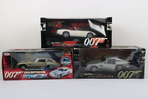 Three 1/18 Scale James Bond 007 Die Cast Model cars.
