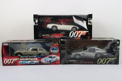 Three 1/18 Scale James Bond 007 Die Cast Model cars.
