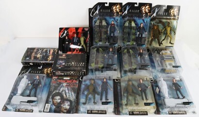 Collection of The X-Files Action Figures, Trading cards and Comics.