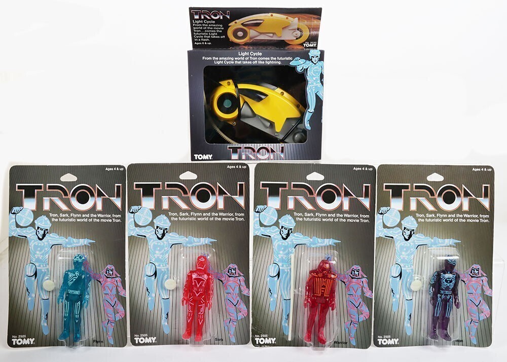 Set of Four Vintage Tron Tomy Action Figures moc carded.