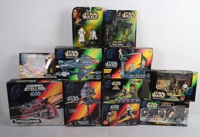 Eleven Power of the Force Star Wars Vehicles and Action Figures in original Packaging.