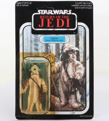 Vintage Star Wars Return of the Jedi Logray (Ewok Medicine Man) Original Carded Moc Action Figure Palitoy. Unpunched. Factory sealed yellow bubble. Minor edge wear. 65A backed card. Overall very good condition.