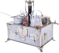 An enamelled tinplate child’s cooking stove, German circa 1890,