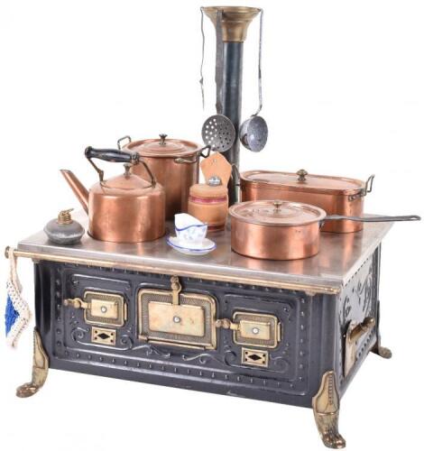 A tinplate child’s cooking stove, German circa 1890,