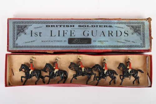 Britains set 1 1st Life Guards, third version 1897, four mounted troopers at the walk and Officer on rearing horse all with tin swords, in a printers label box, (good condition some slight wear, figures tied to backing card probably not original, box good
