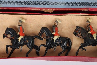 Britains set 1 1st Life Guards, third version 1897, four mounted troopers at the walk and Officer on rearing horse all with tin swords, in a printers label box, (good condition some slight wear, figures tied to backing card probably not original, box good - 2