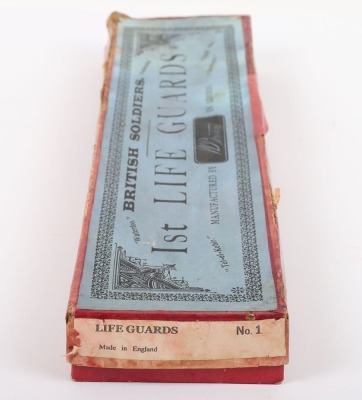 Britains set 1 1st Life Guards, third version 1897, four mounted troopers at the walk and Officer on rearing horse all with tin swords, in a printers label box, (good condition some slight wear, figures tied to backing card probably not original, box good - 4