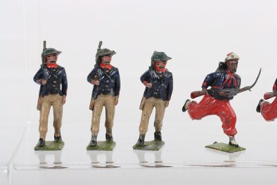 Britains from set 169 Italian Bersagliere, 1925 version, eleven marching with slung rifles, together with five French Zouaves from set 1432, (fair condition), (16). Please note: We do not offer in-house shipping for Toy Soldiers, please see shipping infor - 2