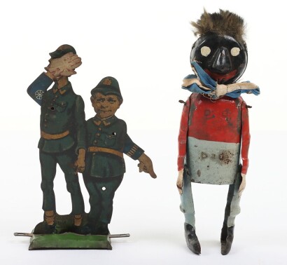 An early tinplate clockwork Golly, probably German circa 1910,
