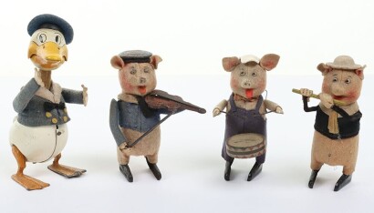 Schuco Donald Duck and three Little Pigs, German circa 1930,