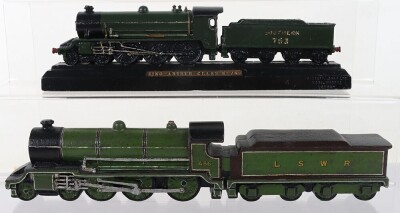Two cast metal locomotive paperweights, - 2