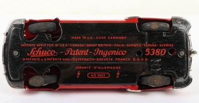 Schuco Ingenico 5380U Limousine Car, red clockwork and battery operated (untested) lithographed and painted tinplate two-door Limousine circa 1952, in very good used original condition, with battery pack (some rusting) and hand steering wire, bonnet masco - 5