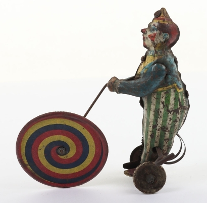 Scarce Distler (Germany) Tinplate Clown with Colour Wheel
