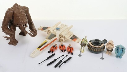 Collection of Vintage Star Wars Action Figures and Vehicle.