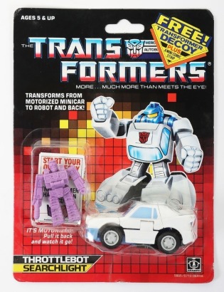 Vintage Generation One G1 Throttlebot Searchlight with Decoy figure and mini comic Transformers action figure moc carded Hasbro.
