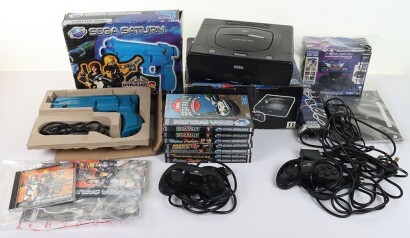 Sega Saturn Console boxed with games.