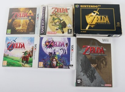 Collection of Nintendo Zelda Games and Cases.