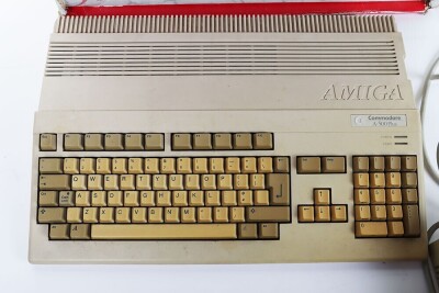 Commodore Amiga 500 console boxed with games. - 2