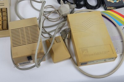 Commodore Amiga 500 console boxed with games. - 3