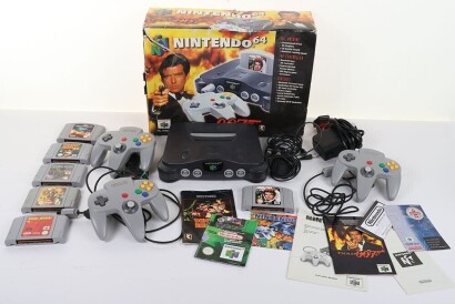 Nintendo 64 Goldeneye 007 Console boxed with loose games and controllers.