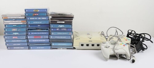 Collection of Sega Dreamcast console and games.
