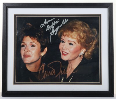 Scarce Carrie Fisher and Debbie Reynolds Singed Autograph picture with certificate of authenticity.