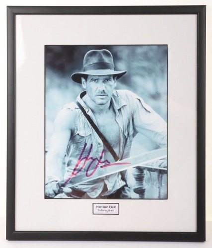 Scarce Harrison Ford signed autograph Indiana Jones Photograph with certificate of Authenticity.