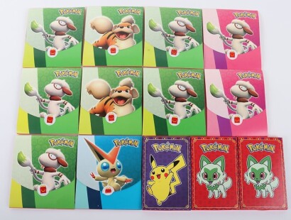 Thirteen Pok&eacute;mon McDonald's unopened packs of trading cards.