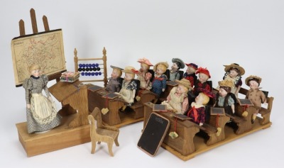 A good miniature schoolroom with twelve pupils, teacher and accessories, German circa 1900,