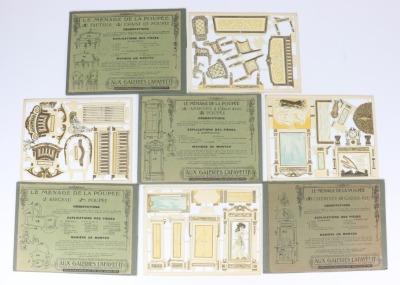 Seven 'Aux Galeries Lafayette Menage De Poupee' unassembled card dolls house furniture, circa 1910,