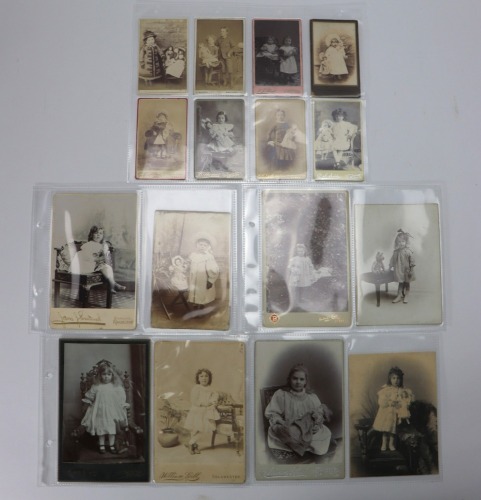 Collection of fifteen Victorian and Edwardian studio photographs of young Children with their Dolls,