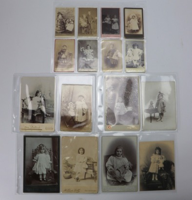 Collection of fifteen Victorian and Edwardian studio photographs of young Children with their Dolls,