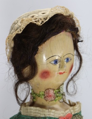 A good early English George II painted wooden doll, circa 1750, - 4