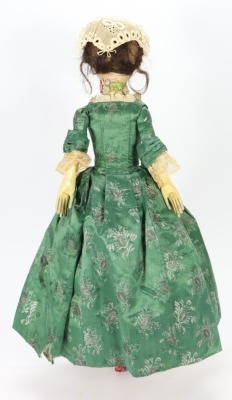 A good early English George II painted wooden doll, circa 1750, - 6