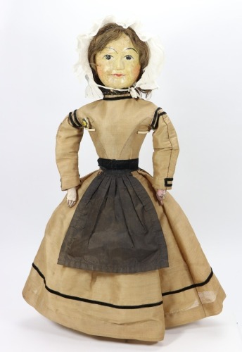 A rare William and Mary carved wooden doll, English circa 1690,