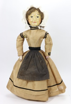 A rare William and Mary carved wooden doll, English circa 1690,