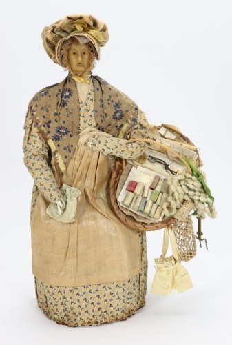 An early nineteenth century English wax peddler doll,