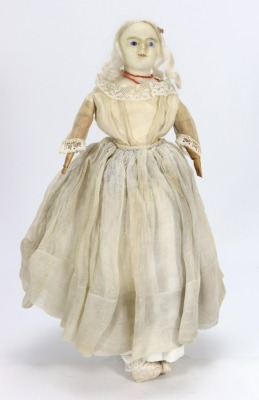A wax over composition shoulder head doll, English 1840s,