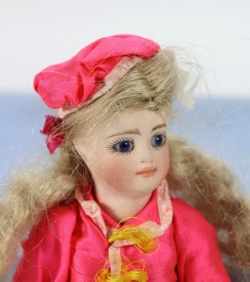 A rare miniature all bisque mignonette doll in trunk, French circa 1880, - 2