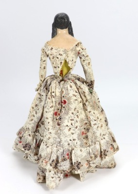 A papier-mache shoulder head doll, German 1840s, - 2