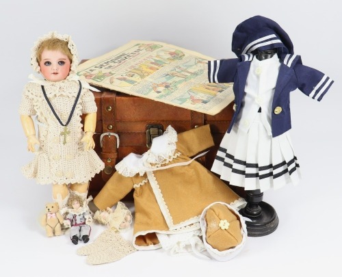 S.F.B.J 301 bisque head doll in wardrobe,