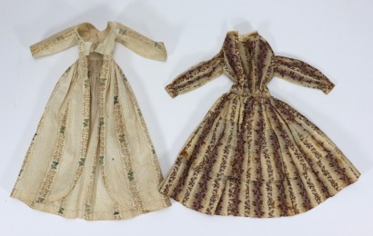 Two early doll dresses, 1830s,