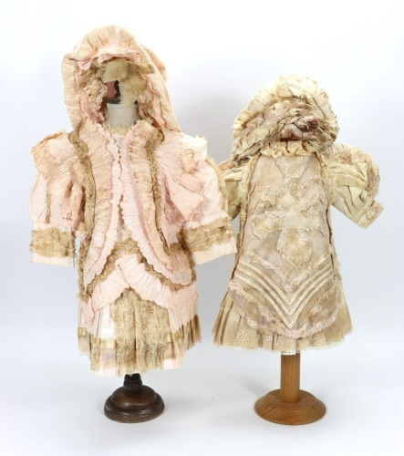 A selection of ten various dolls dresses,