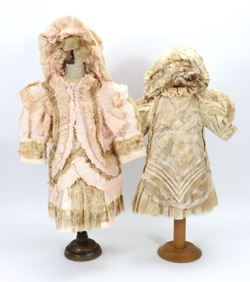 A selection of ten various dolls dresses,