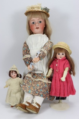A Schoenau & Hoffmeister 250 bisque head doll,