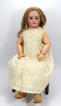 A large DEP bisque head doll, size 14, German for the French market, circa 1905,